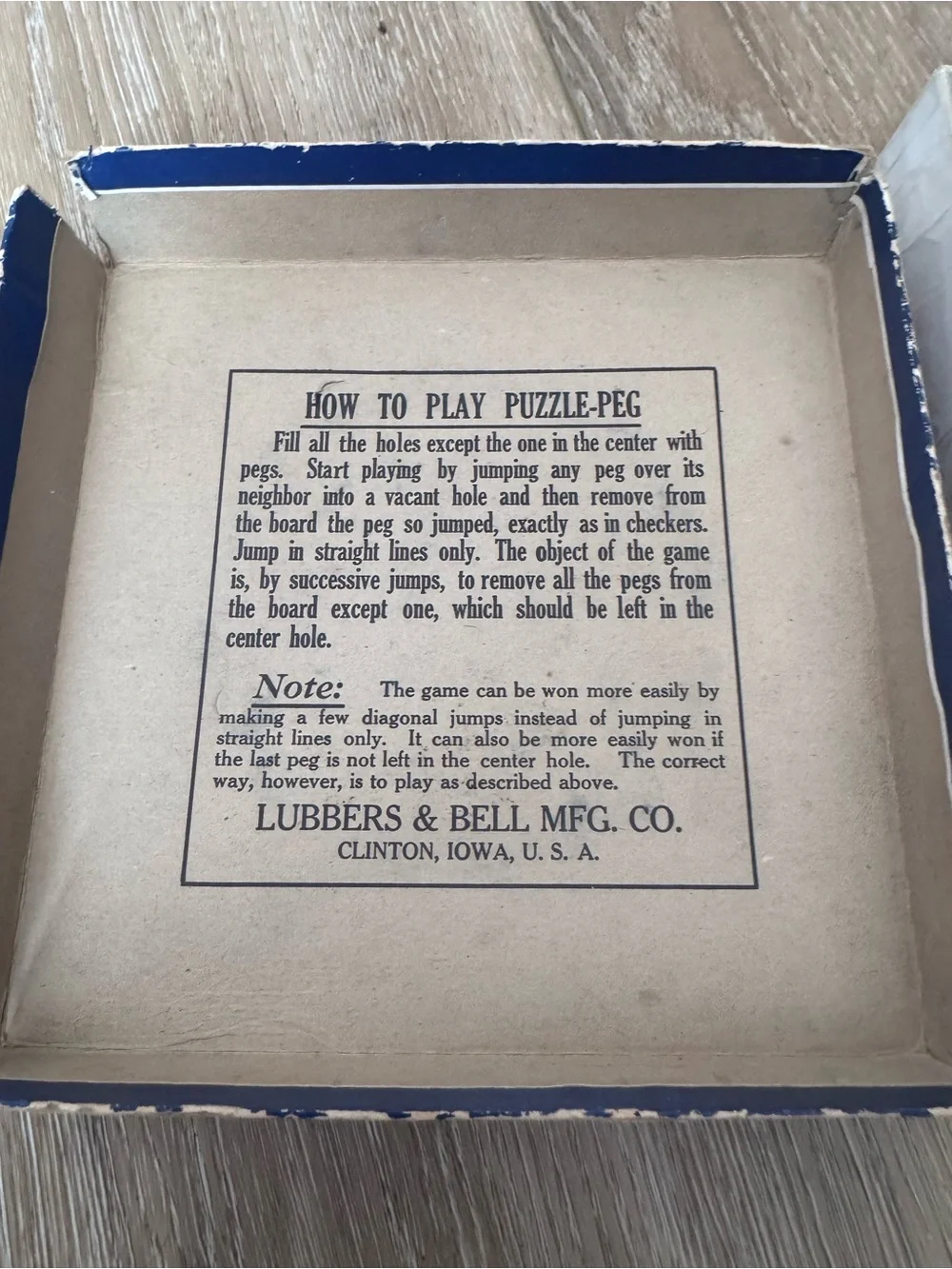 Vintage 1920s Lubbers & Bell Problems puzzle peg game.